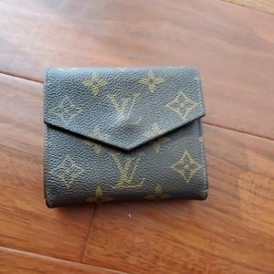 Vintage Louis Vuitton monogram bifold wallet.